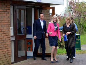 David Cameron leaves the nursery with Conservatdive parliamentary candidate Amanda Milling