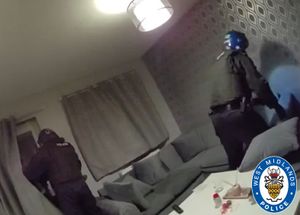 Police officers carrying out raids across Dudley this morning (Wednesday)