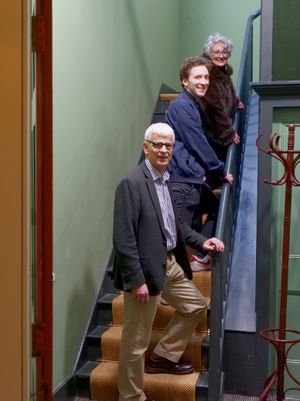 Museum trustee Tim Hodgetts, show the way up to the flats with Ashley Offa of National Lottery Heritage Fund and Candida Pino, the project’s architect.