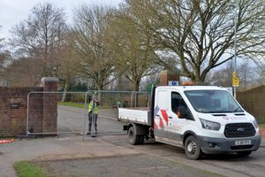 Contractors went to secure the gates on Friday