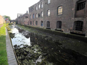 Supporting image for story: Canal drained after vandals jam open lock
