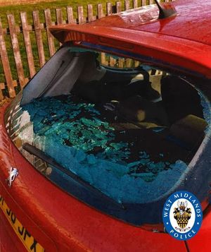 The thug smashed his girlfriend's head through a car window