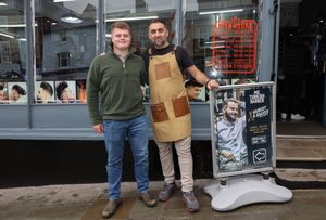 Owen Norgrove with Barber Firat Davutoglu atTurkish Barber in Ludlow, Shropshire. Barber Firat saved customer's Owen's life after finding lump on his neck that turned out to be Hodgkin Lymphoma cancer. Owen is in remission now