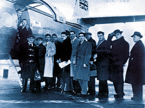 Manchester United players and journalists prepare to board the ill-fated plane