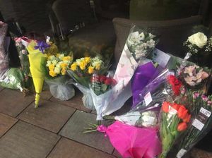 Floral tributes left outside Starbucks on Dudley Street on Thursday
