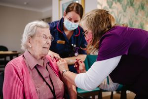 Resident Helen Joan Dyke who is the eldest resident at 104 with deputy manager Beth Stannard and Dr Charlotte Hart (Clinical Care Director for Shrewsbury Primary Care Group)
