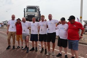 The Cartwrights team with their medals, from left are Matty Pateman, Dave Wellings, Ashley Mills, Gary Yeomans, Louis A.J., Cam Langley, John Cartwright - managing director, and Richard Armstrong.