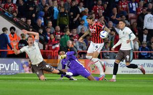 Walsall goalkeeper Myles Roberts produced a couple of excellent saves.