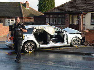 Supporting image for story: Men injured after car strikes wall outside Bilston homes