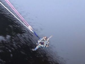 Supporting image for story: Here’s a bagpiper playing Scotland the Brave while doing a 50-metre bungee jump, because why not