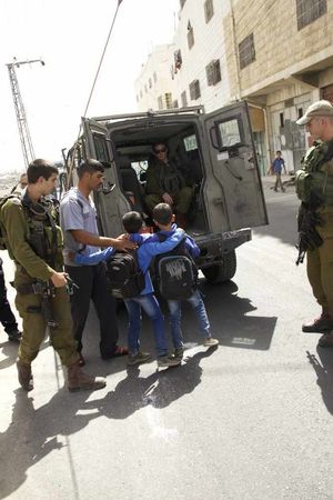 Children aged eight and nine detained by the Israeli military allegedly for throwing stones