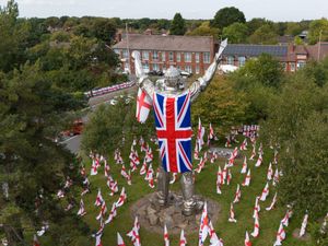 A view of the 14m-tall Brownhills Miner statue, which has been draped in a Union flag, in Walsall, Staffordshire