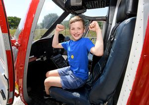 Thomas Hillman sat in the air ambulance cockpit at the open day.