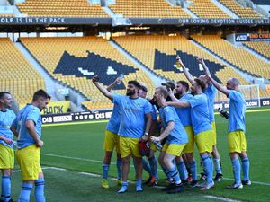 Supporting image for story: Grand day out at Molineux nets money for Ukraine    