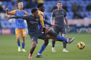 Ismeal Kabia of Shrewsbury Town and Devan Tanton of Chesterfield