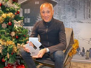 Wham!'s Andrew Ridgeley with the 2024 Christmas number one award