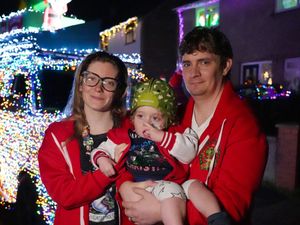 Supporting image for story: VW vans transformed into festive light display delight two-year-old boy