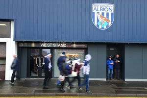 Fans making their way along Halfords Lane outside the West Stand