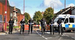 Police look for clues after the killing