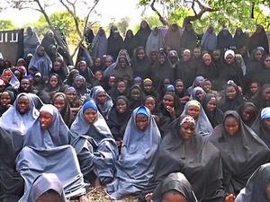 Supporting image for story: Abducted Nigerian girls shown on video