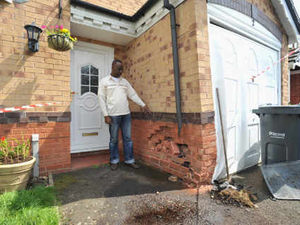 Supporting image for story: Car knocks dad off bike before crashing into West Bromwich house