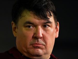 Supporting image for story: Father Ted writer performs outside parliament after two gig cancellations