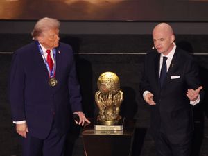 Supporting image for story: Donald Trump awarded inaugural FIFA peace prize at World Cup draw