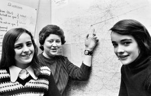 'Louise Douglas (left), of Trench; Jill Woolmore (centre), of Donnington; and Denise Norton, of Trench, three of a group of girls from the John Hunt School, Trench. They have been to Le Mans in France on an exchange visit. They were guests of pupils from CES Jean Cocteau School, Coulaines. April 21, 1975