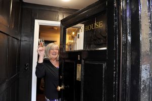 Owner Jo Henshaw celebrates the opening