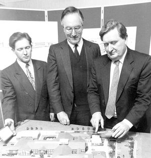 Taking shape... Looking at a model of the new college are, from left, head Kevin Satchwell – later Sir Kevin – Jack Mawdsley, chairman of governors, and Mr Alan Brimer, project director.