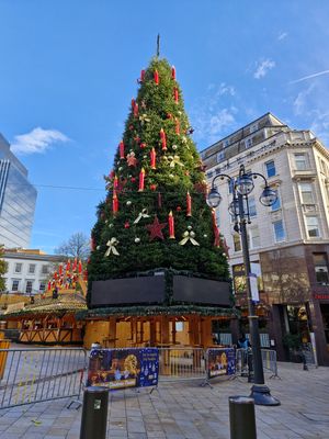 The Christmas tree is enormous and towers over New Street