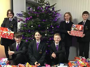Supporting image for story: Pupils enter the Christmas spirit by preparing hampers for the elderly