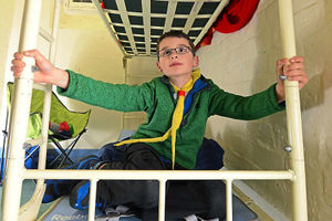 Cub Billy Ballard, eight, checks out his new bed
