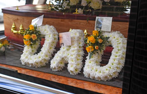 One of the floral tributes to Ken Harris whose funeral cortege left the West End Club where he was president.