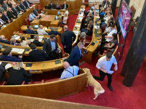 Cllr Steve Edwards (white shirt) and Cllr Andrew Tromans leaving the meeting of Dudley Council on April 28 after Cllr Edwards clashed with mayor Hilary Bills. Picture Martyn Smith/LDRS free for LDRS use