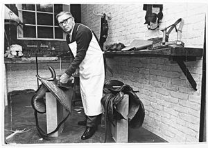 Walsall's Mayor Alderman J A Thompson opened a museum of leathercraft in the town's central library and art gallery. Included were items loaned by the Council of the Museum of Leathercraft in London. The photograph shows saddlemaker Frank Mumford of Bernard Street, Walsall