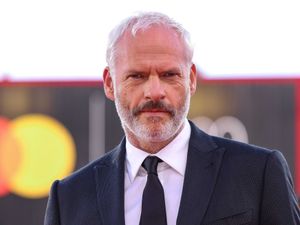 Supporting image for story: Martin McDonagh shows support for writers on first day of Venice Film Festival