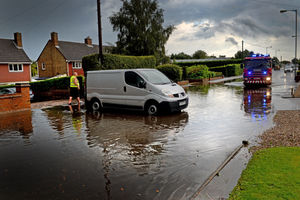 Flash flooding on Hednesford Road by Cannock Chase High School.