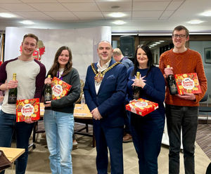 Mayor of Wolverhampton, Cllr Craig Collingswood, with one of the winning teams at the recent quiz and chips evening