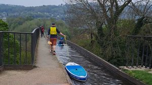 You must walk with a SUP across the aqueduct