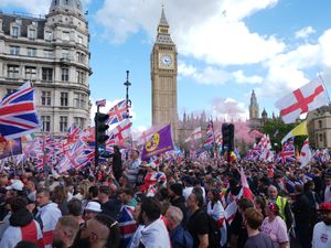 People taking part in a Tommy Robinson-led Unite the Kingdom march