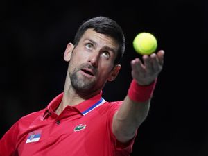 Novak Djokovic prepares to serve