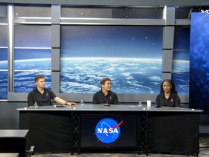 Astronauts Matthew Dominick, Michael Barratt and Jeanette Epps participate in a news conference