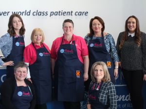 Supporting image for story: Oswestry estate agents donates aprons to hospital volunteers