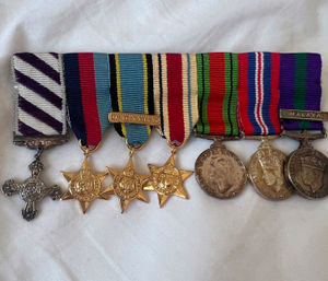 These miniatures of Peter's medals are cherished possessions for granddaughter Jessica.