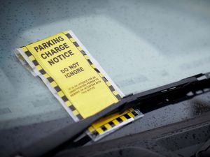 A parking charge notice on a windscreen