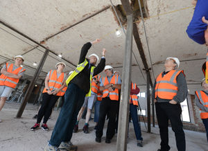 Guide Penny Ward explaining the iron beam construction