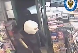 The masked men enter the store