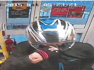 Supporting image for story: 'Minnie Mouse was his ultimate downfall': Armed thief who raided Dudley convenience store caught by his Disney gloves