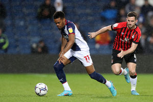 Grady Diangana of West Bromwich Albion and Lewis Cook of AFC Bournemouth during the Sky Bet Championship match between West Bromwich Albion and AFC Bournemouth at The Hawthorns on April 6, 2022 in West Bromwich, England. (Photo by Adam Fradgley/West Bromwich Albion FC via Getty Images).